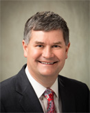 Mark W. Bucher